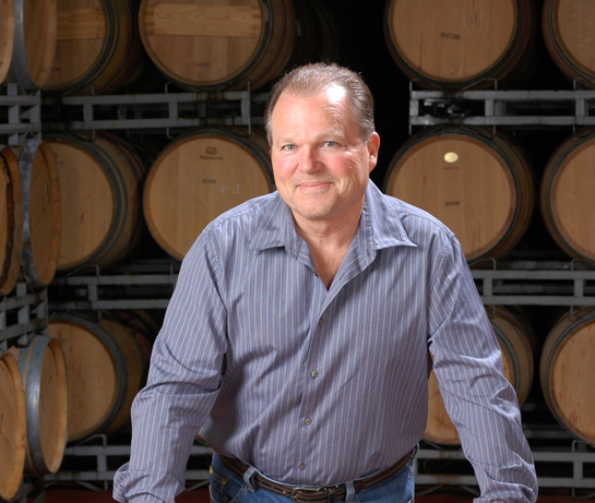 Chuck Wagner of Caymus Vineyards in barrel room